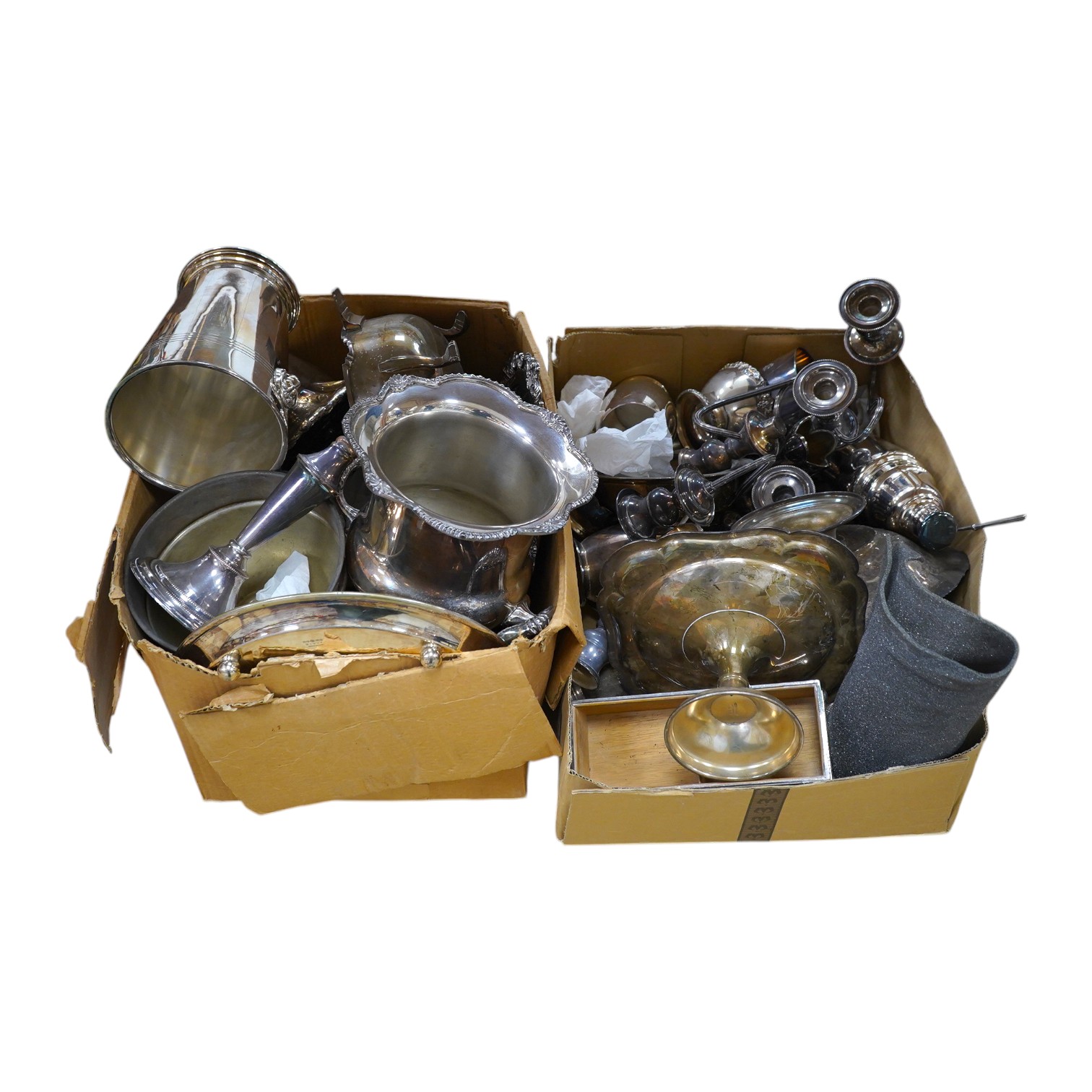 A quantity of assorted plated wares to include candelabra, wine coolers and pedestal dishes. Condition - varies, mostly fair